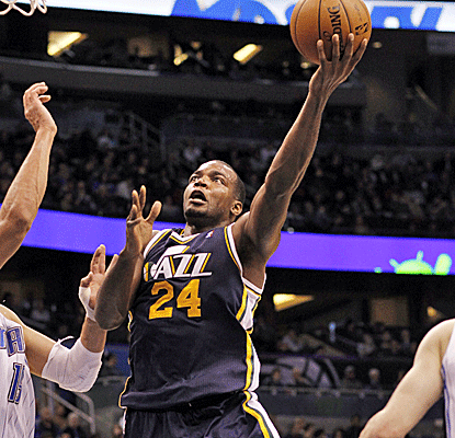 Paul Millsap scores a team-high 18 points as the Jazz survive a fourth-quarter rally to edge the Magic.  (AP)