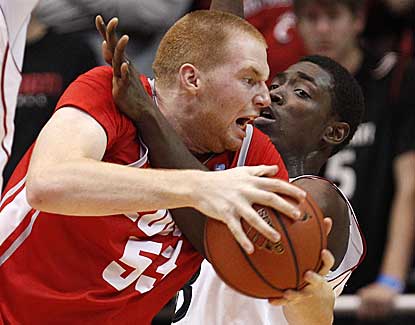 New Mexico's Alex Kirk (53) scores 15 with a crucial block late in the Lobos' win at Cincinnati. (US Presswire)