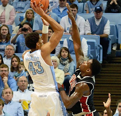 Forward James Michael McAdoo (13 points) is one of five UNC players to reach double figures in scoring. (US Presswire)