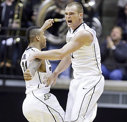 D.J. Byrd (right) scores nine of his 15 points during a crucial Purdue run in the second half. (AP)