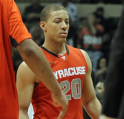 Brandon Triche scores 20 points to help Syracuse to its fourth straight win following its only loss of the year.  (US Presswire)