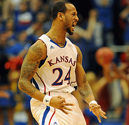 Travis Releford, who scores 14 points, reacts in the waning moments of Kansas' narrow victory over Temple.  (US Presswire)