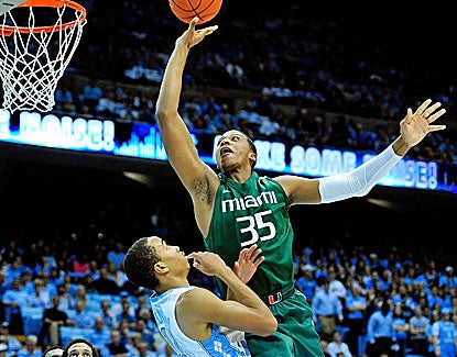 Miami's Kenny Kadji scores 18 points to go with 9 rebounds and 3 assists against North Carolina. (Getty Images)