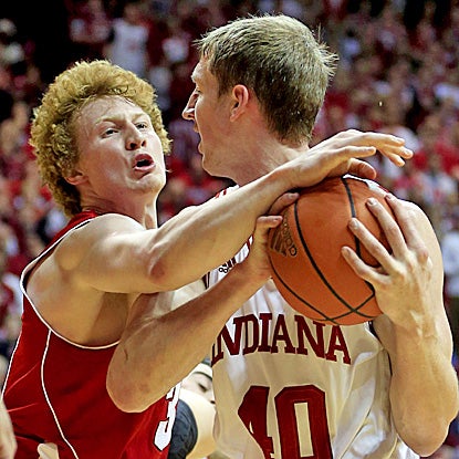 Mike Bruesewitz (left) and the Badgers limit Indiana star Cody Zeller (right) to just three points in the second half. (AP)