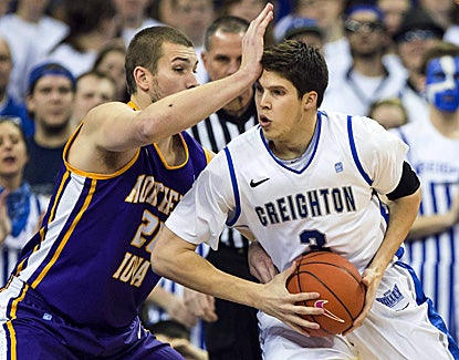 Northern Iowa's Jake Koch (left) tries to slow Creighton's Doug McDermott, who finishes with 31 points.   (AP)