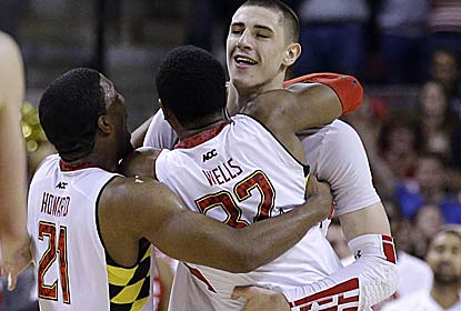 Alex Len cleans up a missed shot with 0.9 seconds left to seal the win for the Terps, who had lost 17 straight to ranked foes. (AP)