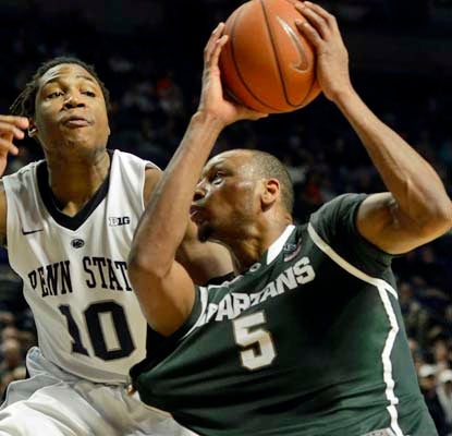 The Spartans' Adreian Payne ends an eventful day with a career-best 20 points in the win over Penn State.  (AP)