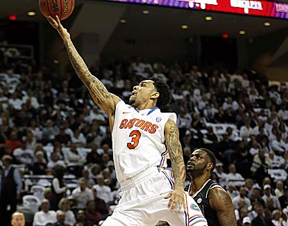 Mike Rosario leads the way with 19 points for Florida, which has held eight foes to fewer than 50 points this season. (AP)