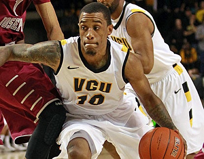 Darius Theus scores a career-high 22 points to go with 10 assists and four steals for the Rams. (US Presswire)