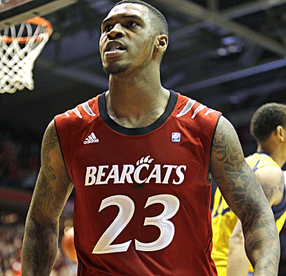 Sean Kilpatrick scores a career-high 36 points to help keep Cincy from blowing a huge lead vs. Marquette.  (AP)