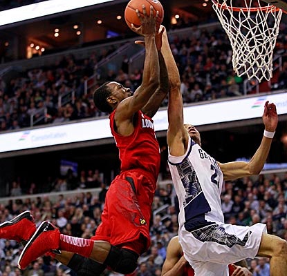 Hoyas forward Otto Porter adds a block to his 17 points and 12 boards as Georgetown sends the Cards to loss No. 4. (US Presswire)
