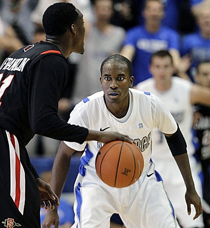 Michael Lyons (right) scores 20 points as the Falcons fend off No. 22 San Diego State for a win. (AP)