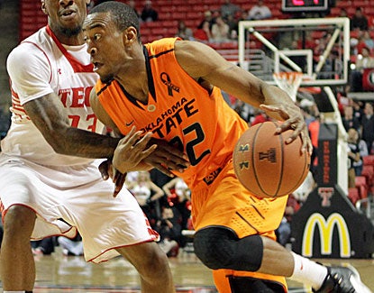 Oklahoma State's Markel Brown scores 25 points and matches a career high with seven 3-pointers, all in the first half. (US Presswire)