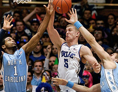 Duke center Mason Plumlee scores 18 points and grabs 11 rebounds to help the Blue Devils get past rival North Carolina. (US Presswire)