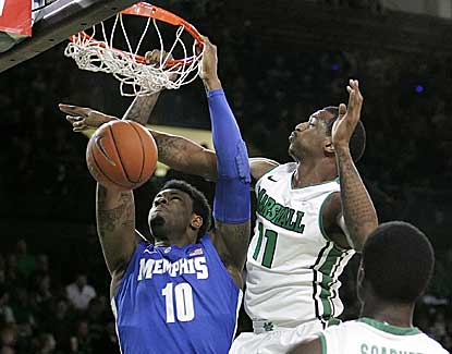 Memphis' Tarik Black throws down the dunk as the Tigers extend their winning streak to 16 games. (AP)