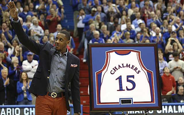 Kansas retires the jersey of former guard Mario Chalmers before the Jayhawks' game against Texas. (AP)