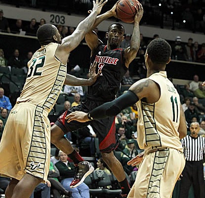 Russ Smith finishes with a game-high 15 points for the Cardinals, going 7-for-7 from the free-throw line. (US Presswire)