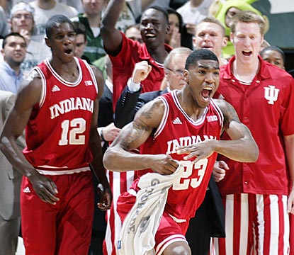 Remy Abell (23) leads the cheers for Indiana after the top-ranked Hoosiers break a 17-game losing streak in East Lansing.  (AP)