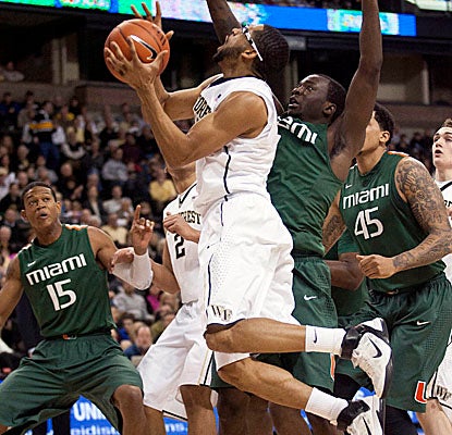 C.J. Harris lays it up for the Deacons. The senior guard hits 5 of 5 treys vs. Miami and finishes with 23 points. (USATSI) 