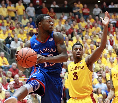 Elijah Jonhson scores a career-high 39 points to help coach Bill Self reach the 500-win milestone. (USATSI) 