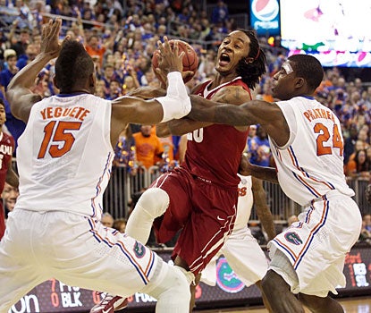 Casey Prather (24) leads the way as the Gators clamp down on defense in the second half.  (USATSI)