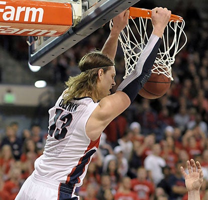Zags junior forward Kelly Olynyk slams down 2 of his 15 points. He also finishes with 11 rebounds. (AP)