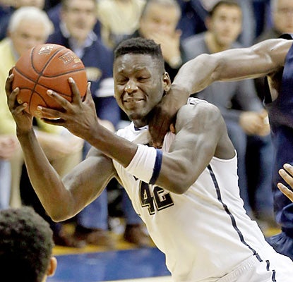 Talib Zanna shrugs off a foul to grab one of his career-high 19 rebounds for No. 23 Pittsburgh.  (AP)