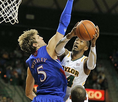 Cory Jefferson puts up 25 points against fourth-ranked Kansas, helping Baylor's cause for a berth in the NCAA tournament. (AP)