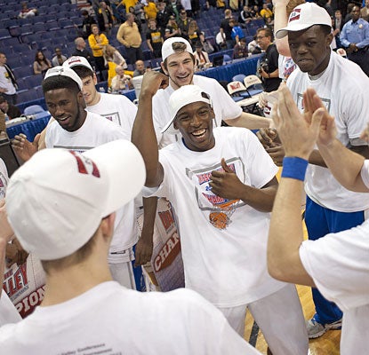 Creighton celebrates after winning its second straight MVC tournament title and 12th overall.  (USATSI)