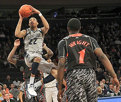 Otto Porter Jr. goes up for two of his 18 points against Cincinnati in the Hoyas' win during Big East tourney quarterfinals.  (AP)