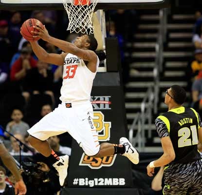 Oklahoma State is moving on in the Big 12 tournament thanks to freshman Marcus Smart's 21 points.  (Getty Images)