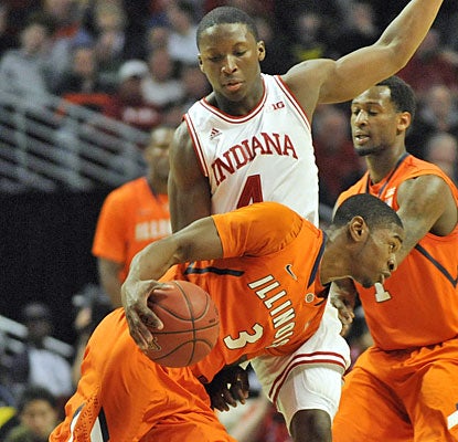 Indiana's Victor Oladipo scores 12, grabs 11 rebounds and steps up on defense vs. Illinois star Brandon Paul.  (USATSI)