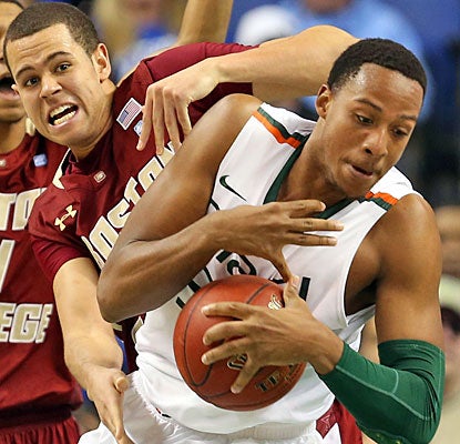 Kenny Kadji contributes 15 points to help top-seeded Miami fight off the upset bid from Boston College.  (Getty Images)