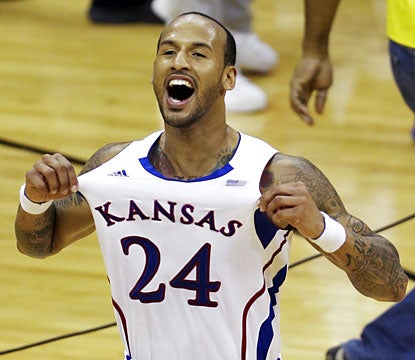  Travis Releford's Jayhawks get the job done once again in the Big 12 tournament championship. (AP)