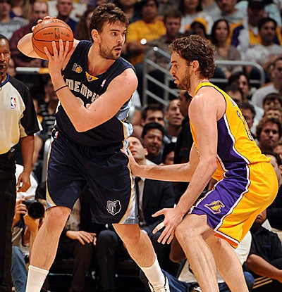 Marc Gasol, left, with 11 points and eight boards, trails brother Pau, who has 21 and 13 for L.A. (Getty Images)