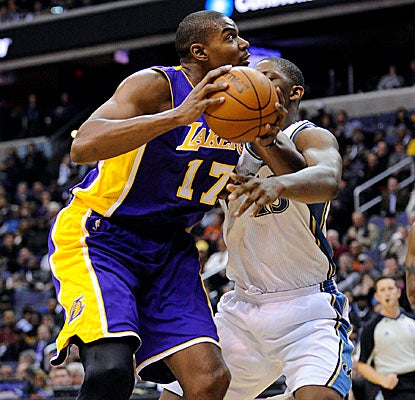 In his return from injury, Andrew Bynum contributes 17 minutes and seven points toward a Lakers win. (AP)