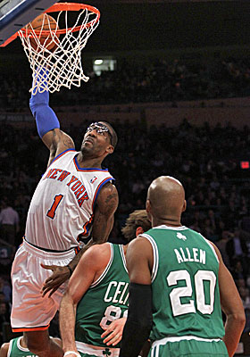 Amar'e Stoudemire scores two of his his 39 points against the Celtics. (Getty Images)