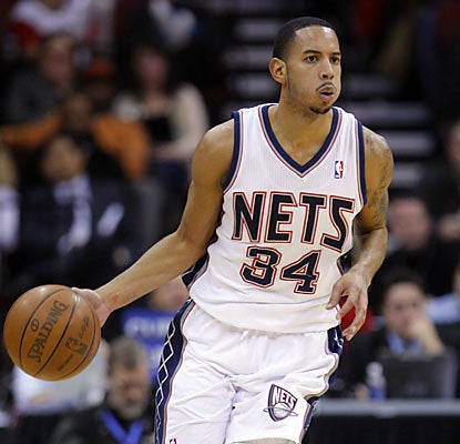 Devin Harris finishes with 29 points and nine assists to help hand Washington its 13th straight road loss. (US Presswire)