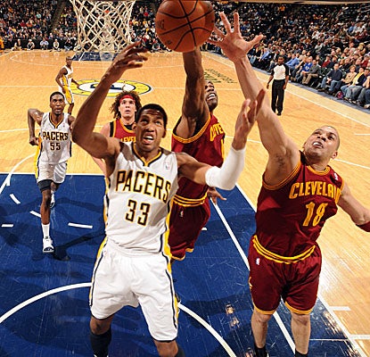 Danny Granger battles for one of his season-high 12 boards Friday as the Pacers down the Cavs. (Getty Images)