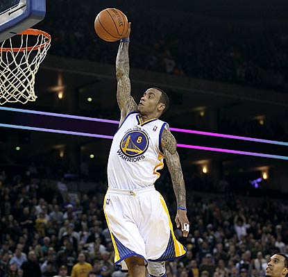 Monta Ellis puts on a show for the Golden State fans, but it's not enough to break the Warriors out of their malaise.  (AP)