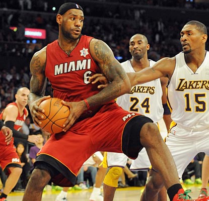LeBron is on his game for Christmas, hauling in 11 rebounds to go with a game-high 27 points and 10 assists.  (US Presswire)