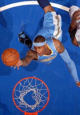 Seven-year veteran Carmelo Anthony has 21,476 NBA game minutes -- and counting -- under the hood. (Getty Images)