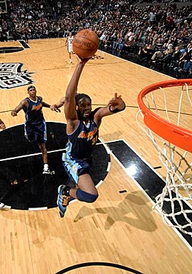 Nene is racking up 15.2 ppg this season, three more than the eight-year veteran's career average. (Getty Images)