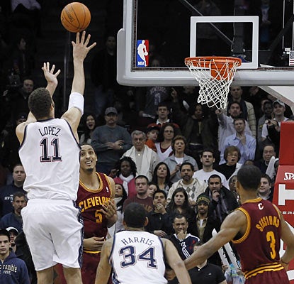 Brook Lopez, who scores a game-high 28 points, saves the best for last with this tiebreaking jumper with 1.4 seconds left.  (AP)