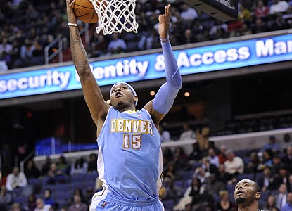 Carmelo Anthony -- with a team-high 23 points -- continues to perform at a high level amid trade talks. (AP)