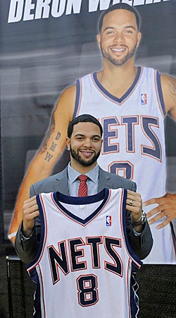The Nets hope Deron Williams -- the player and the marketing tool -- comes with them to Brooklyn. (AP)