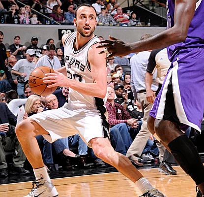 Manu Ginobili pulls Kings defenders toward the perimeter in the Spurs' home win. (Getty Images)