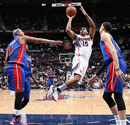 Hawks big man Al Horford gets off a shot vs. the Pistons, wrapping up with 18 points. (Getty Images)