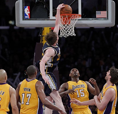 Rookie Gordon Hayward scores a career-high 22 points, including a crucial free throw late that puts Utah up for good.  (AP)