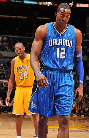 An L.A.-Orlando swap would boost Kobe Bryant, put Dwight Howard in a preferred destination and give his old team some relief. (Getty Images)